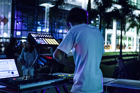 Frost School of Music student performing outside the Donna E. Shalala Student Center